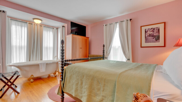 interior view of Rose Room tub and bed