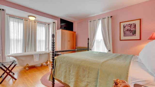interior view of Rose Room tub and bed